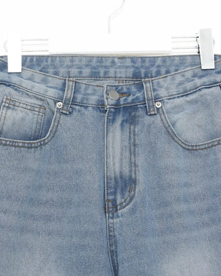 Wide-leg denim with side pleats