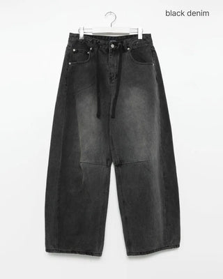 Pointed denim pants with contrasting panels