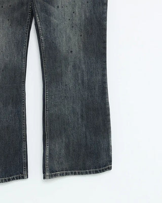 Oil-washed flared denim pants