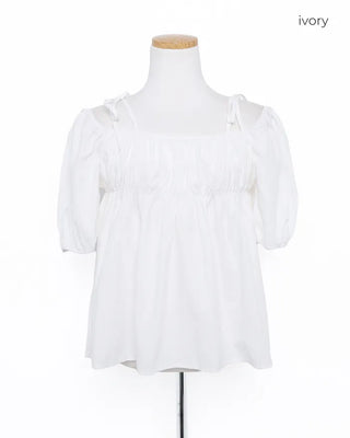 Shirred off-shoulder blouse