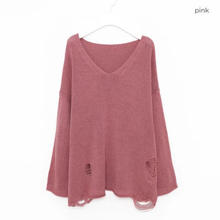 Distressed long knit sweater