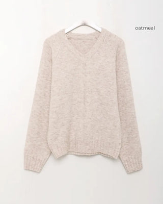 V-neck stitched raglan knit sweater