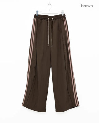 Wide-leg nylon jersey pants with hip pockets