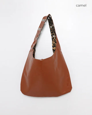 Leather leopard reversible eyelet one-shoulder bag