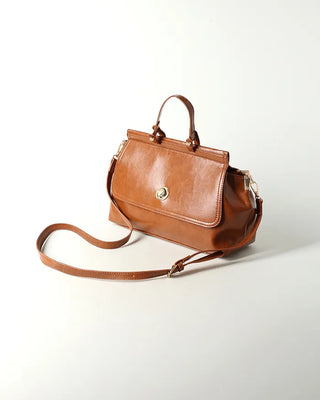 Gold button shoulder bag