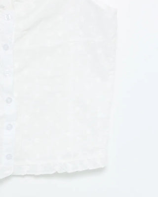 Frilled hem sleeveless blouse