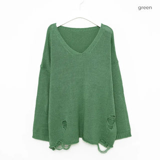 Distressed long knit sweater