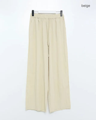 Frilled sleeveless top and wide-leg pants set