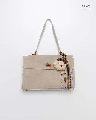 Suede gold buckle bag