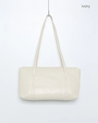 Slide pocket shoulder bag