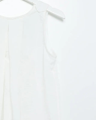 Sleeveless top with back slit