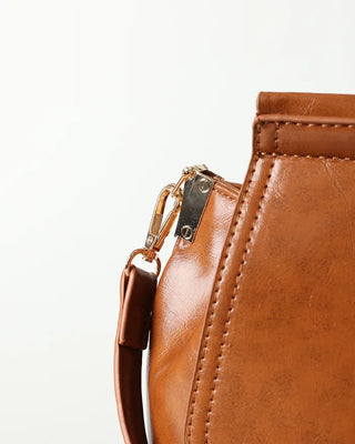 Gold button shoulder bag