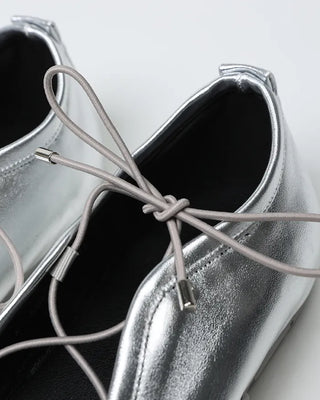 Lace-up flat sneakers