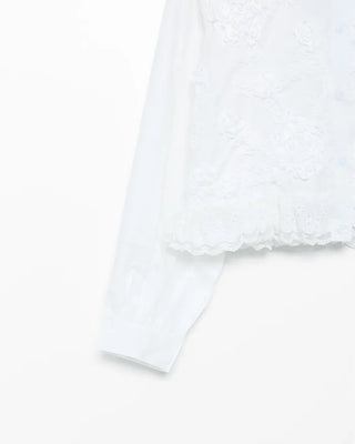 Flower embroidered peplum blouse