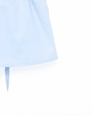 Half-button peplum camisole