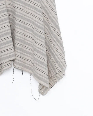 Unique strap cut-off midi skirt