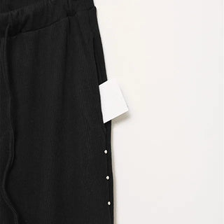 Side-studded knit flared pants