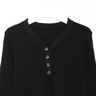 V-neck ribbed knit with gold buttons.