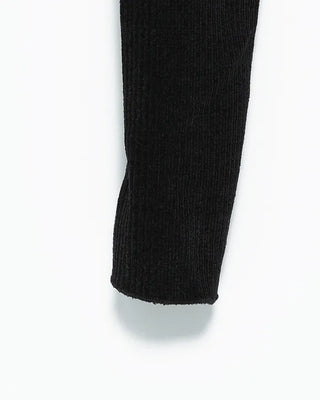 Open-heel ribbed knee-high socks layered pants