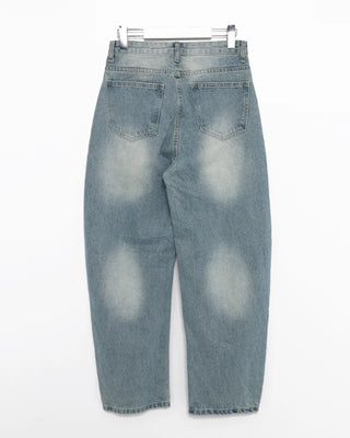 Knee-damaged vintage denim pants