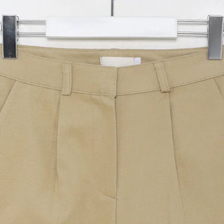 Brushed-back cotton pleated pants