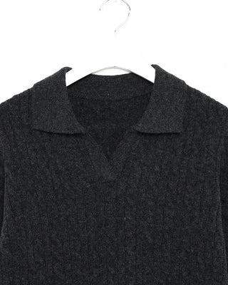 Open-collar cable knit sweater
