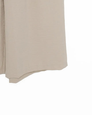 Two-button strap slacks