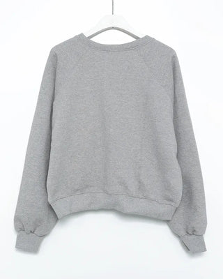 V-neck raglan shoulder sweatshirt