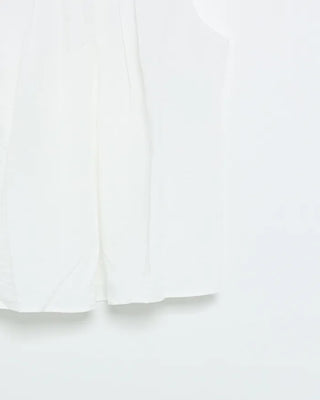 Sleeveless top with back slit