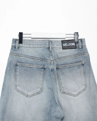 Distressed wide-leg denim