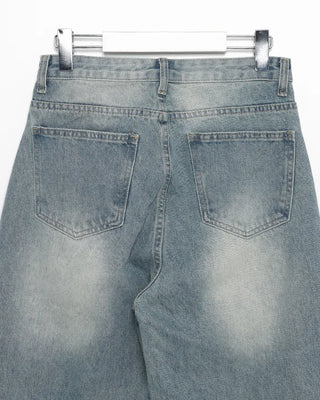 Knee-damaged vintage denim pants