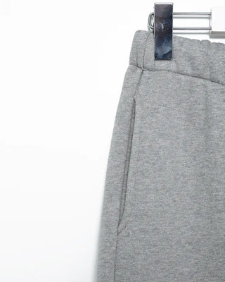 Open-heel ribbed knee-high socks layered pants