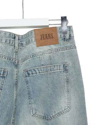 Curved silhouette denim pants