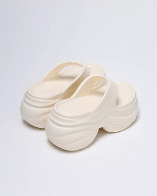 Volume high-soled flip-flops