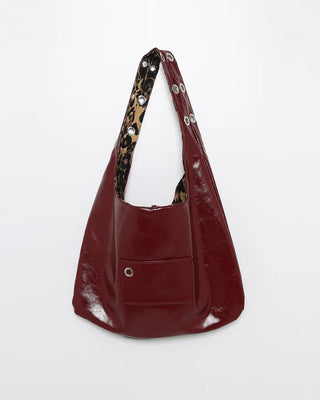 Leather leopard reversible eyelet one-shoulder bag