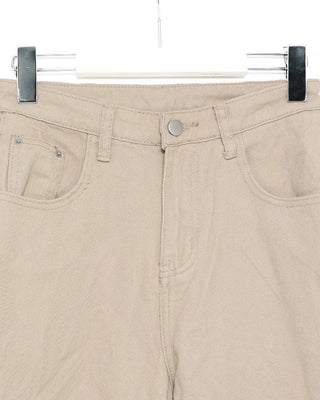 Side-tucked white cotton pants