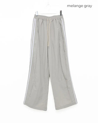 Wide-leg nylon jersey pants with hip pockets