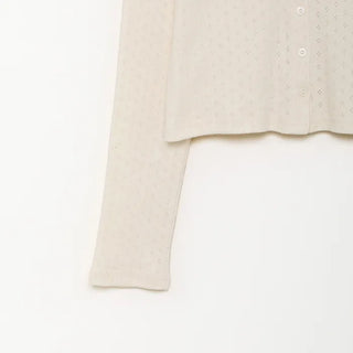 Round punching cardigan