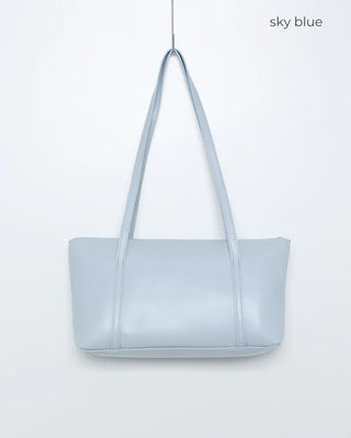Slide pocket shoulder bag