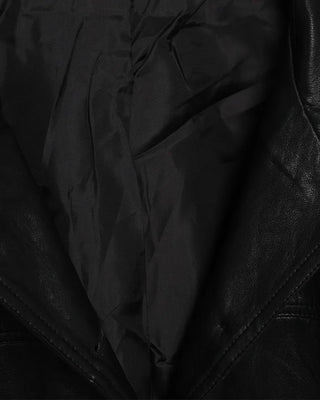Two-tone leather jacket with contrasting sleeves.