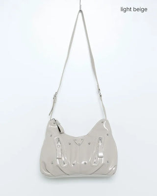 Multi-zip studded shoulder bag