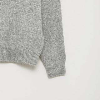 Deep V-neck loose knit