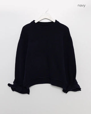 Knit sweater with ribbon detail on the sleeves