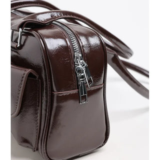 Two-pocket half-moon shoulder bag