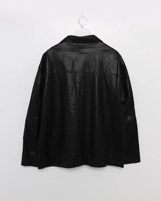 Two-tone leather jacket with contrasting sleeves.