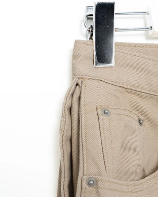 Side-tucked white cotton pants