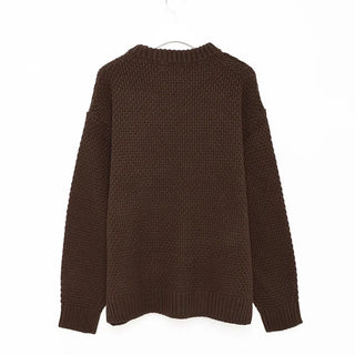 Round punched knit sweater