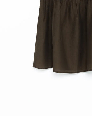 Back-button sleeveless blouse