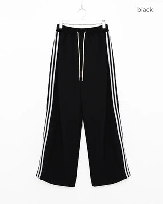 Wide-leg nylon jersey pants with hip pockets
