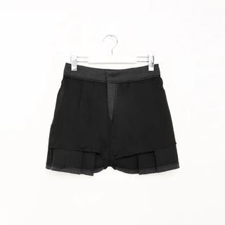 One-pocket pleated mini skirt